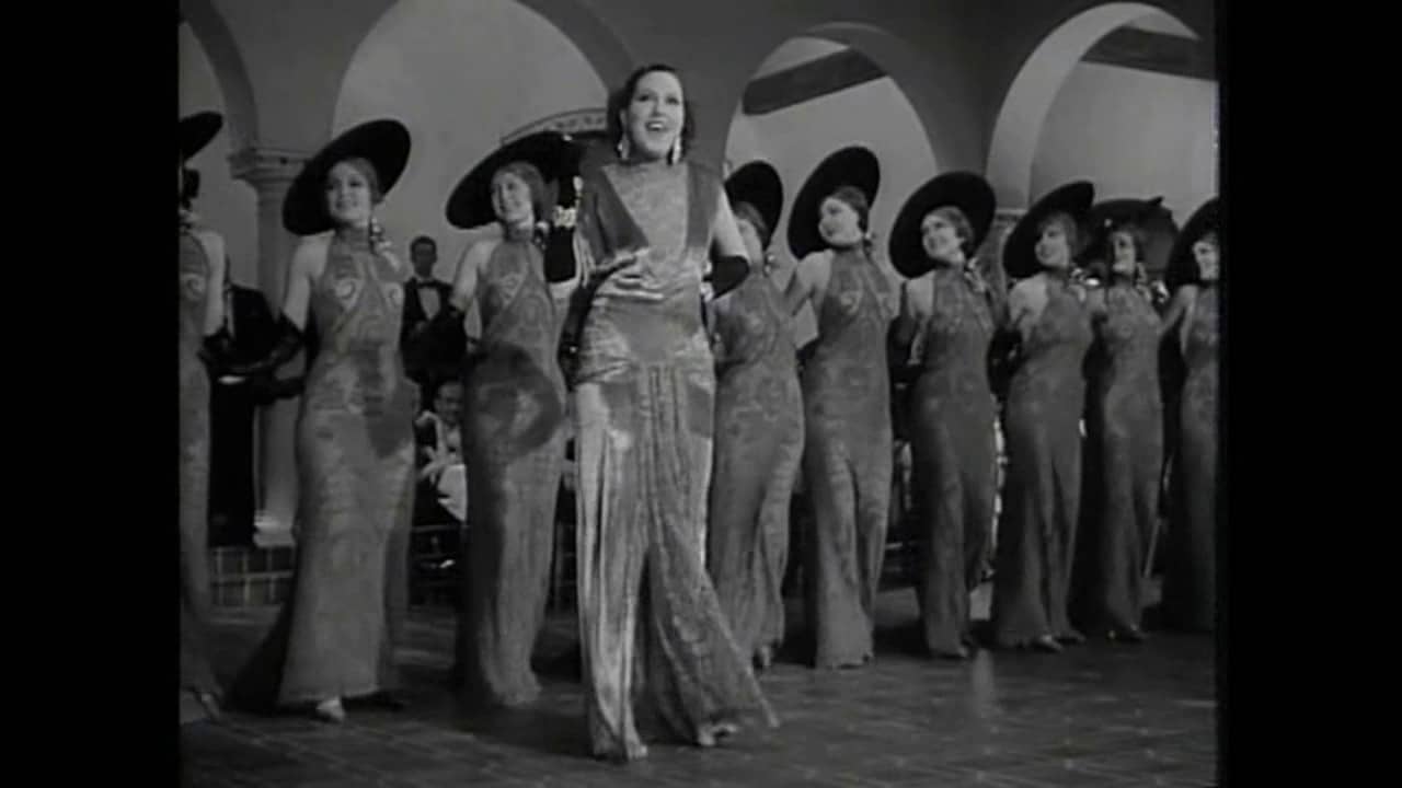 Song lyrics to The Lady in Red, music by Allie Wrubel, lyrics: Mort Dixon, from the film In Caliente, also performed by Desi Arnaz in the I Love Lucy episode Lucy is Enciente